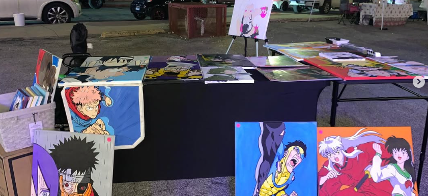 Photo of booth selling anime paintings that was across from our booth